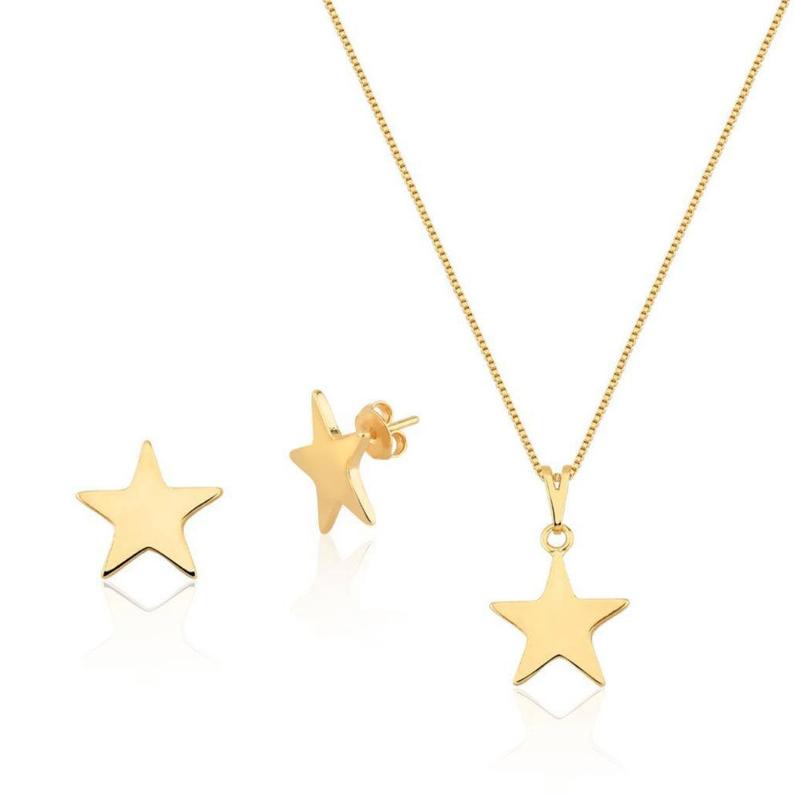 A matching gold star jewelry set features a delicate star pendant necklace and two star stud earrings against a clean white background.