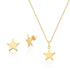 A matching gold star jewelry set features a delicate star pendant necklace and two star stud earrings against a clean white background.