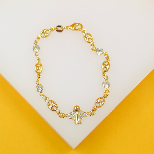 A delicate gold link bracelet features a sparkling angel pendant adorned with small crystals and rests against a white and yellow background.