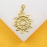 A polished gold mandala pendant rests against a white and yellow display stand.