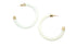 A pair of white hoop earrings features polished gold caps at the post and tip against a plain white background.
